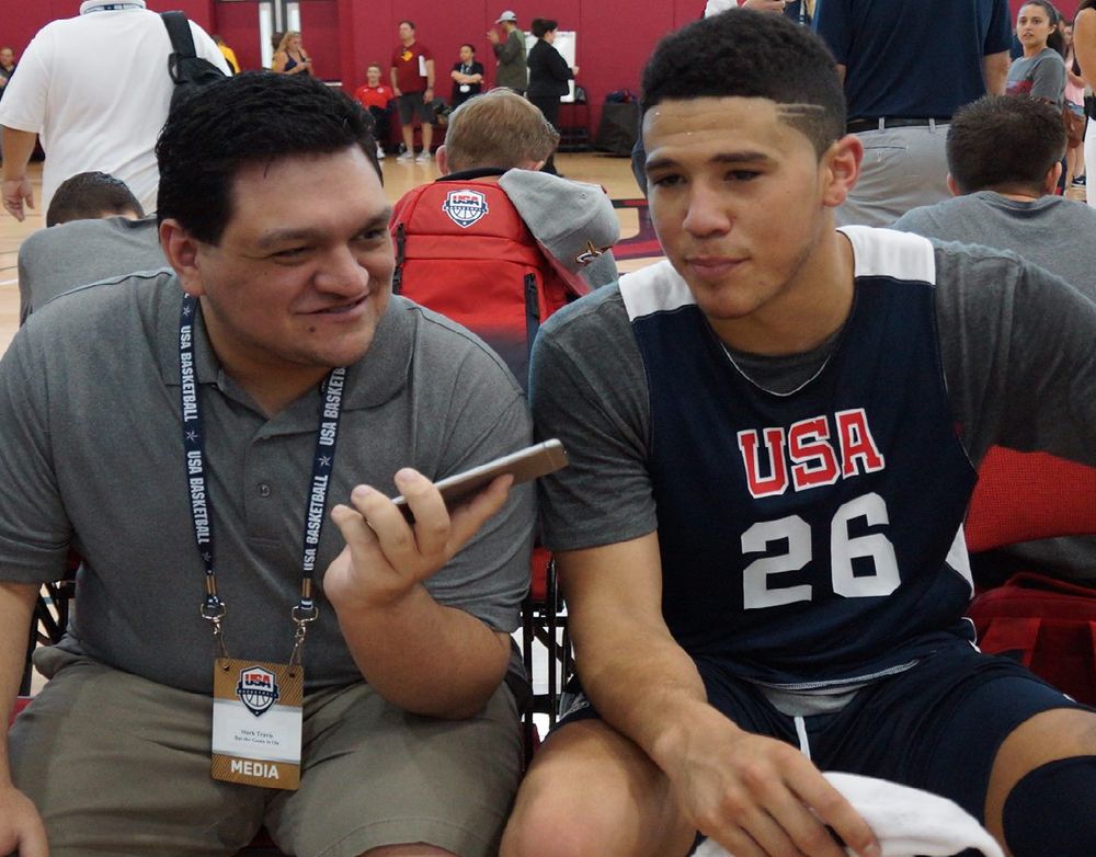 Mark Travis interviewing Devin Booker at USA Basketball